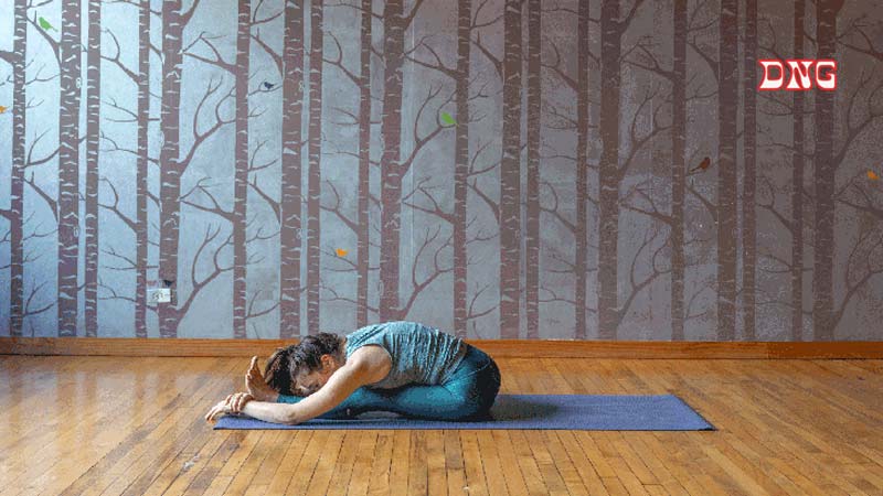 Practice yoga before bed with your head touching your knees.